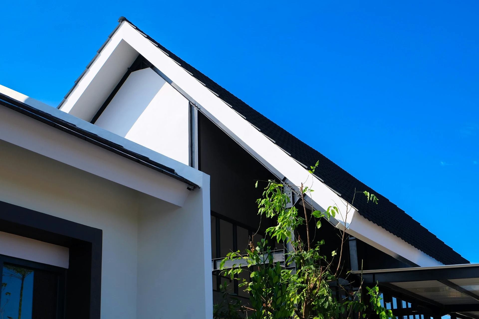 Modern home with a clean dark roof